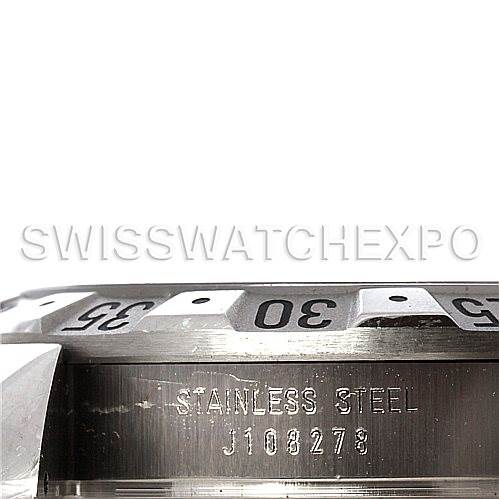 The image shows a close-up of the bezel and case back of the Tudor Hydronaut 20020 Men's Stainless Steel White Dial 20020 Men's Stainless Steel White Dial watch, highlighting its stainless steel content and serial number.