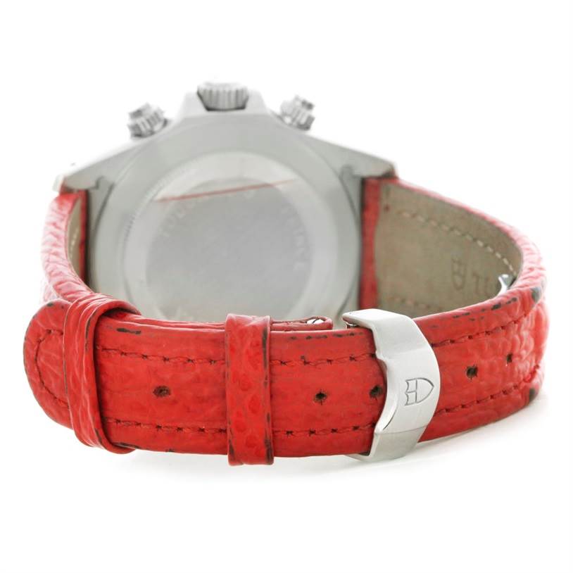 This image shows the rear view of a Tudor Tiger 79270 Men's Stainless Steel Red Dial 79270 Men's Stainless Steel Red Dial model watch, focusing on the case back and the red leather strap.