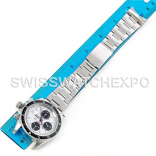 The image shows a Tudor Tiger 79280 Men
s Stainless Steel White Dial 79280 Men
s Stainless Steel White Dial model watch laid flat next to a blue ruler, displaying its face, bezel, and metal bracelet.