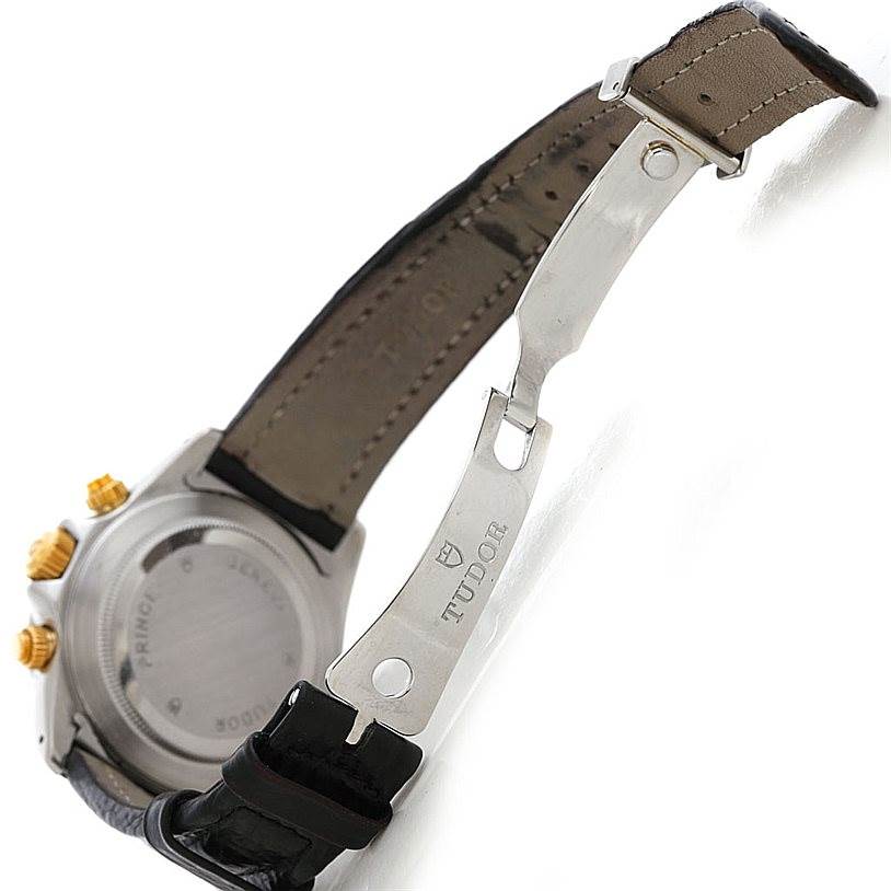 The image shows the back case and open clasp of the Tudor Tiger 79263 Men's Steel and Gold (two tone) White Dial 79263 Men's Steel and Gold (two tone) White Dial model watch, revealing the brand marking on the clasp.