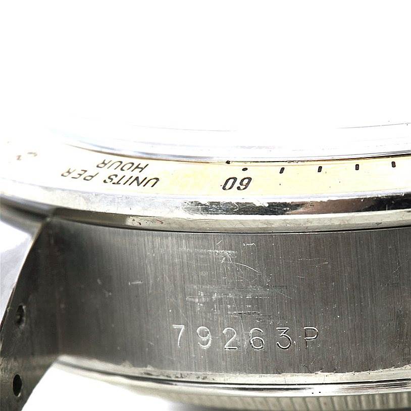 The image shows a close-up, side angle of the Tudor Tiger 79263 Men's Steel and Gold (two tone) White Dial 79263 Men's Steel and Gold (two tone) White Dial watch case, including part of the bezel and the model number (79263).