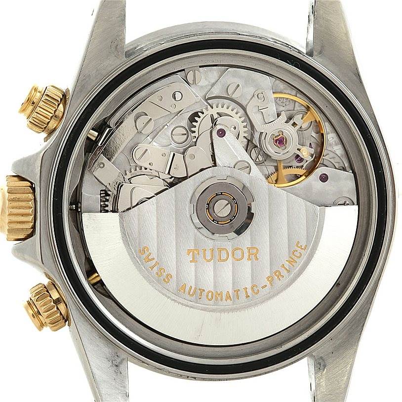 This image shows the inner mechanism and movement of the Tiger model by Tudor from a back view with the case removed.
