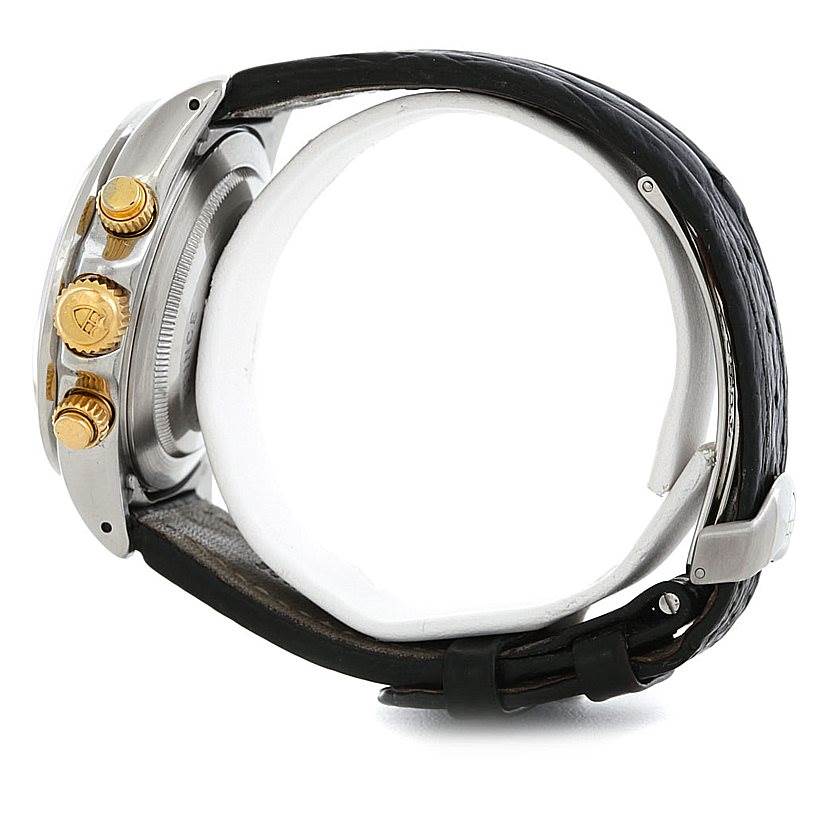 This side view of the Tudor Tiger 79263 Men's Steel and Gold (two tone) White Dial 79263 Men's Steel and Gold (two tone) White Dial model watch shows the crown, chronograph pushers, and leather strap.