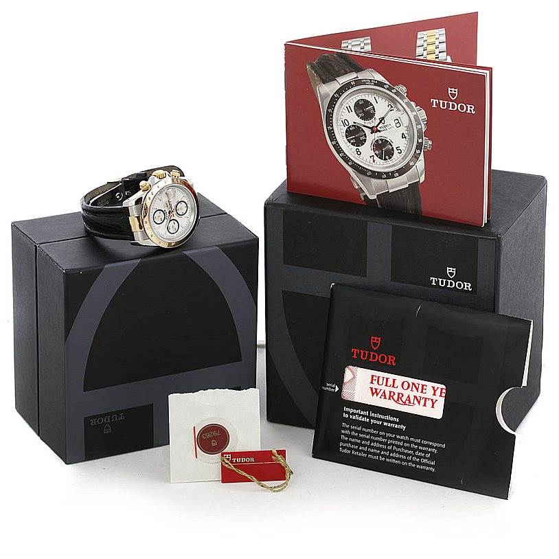 The image shows a Tudor Tiger 79263 Men's Steel and Gold (two tone) White Dial 79263 Men's Steel and Gold (two tone) White Dial watch and its accessories, including a box, warranty card, and user manual.