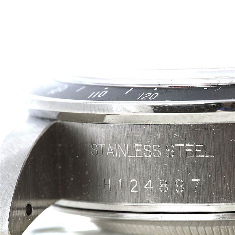 This image shows a close-up angle of the side of a Tudor Prince model watch, focusing on its stainless steel case and engraved serial number.