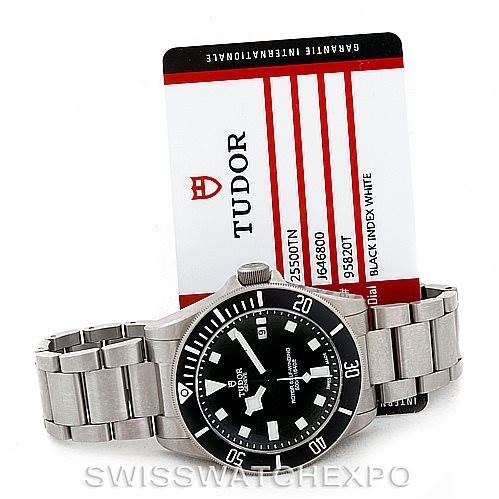 The image shows the front of a Tudor Pelagos 25500TN Men's Titanium Black Dial 25500TN Men's Titanium Black Dial watch laying flat with its card facing forward.