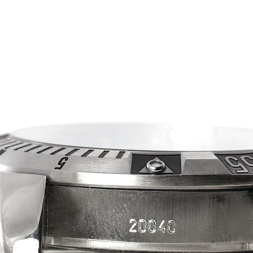 This side view of the Tudor Hydronaut 20040 Men
s Stainless Steel Black Dial 20040 Men
s Stainless Steel Black Dial watch shows part of the bezel and case, including the model number "20040" engraved.