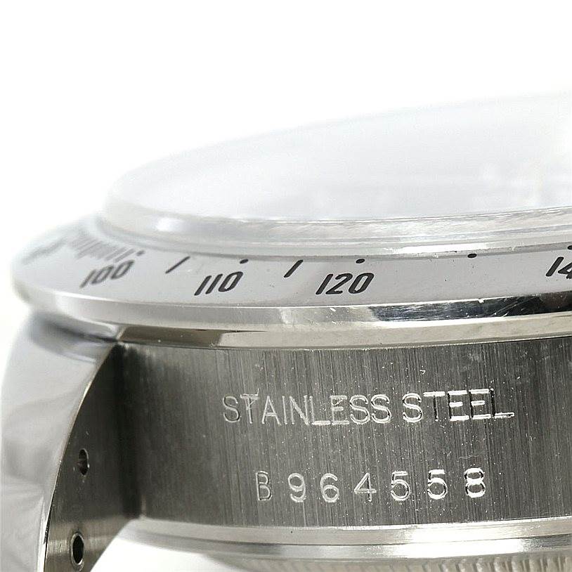 This image shows a close-up side view of the bezel, case, and serial number of a stainless steel Tudor Tiger 79280 Men's Stainless Steel Blue Dial 79280 Men's Stainless Steel Blue Dial watch.