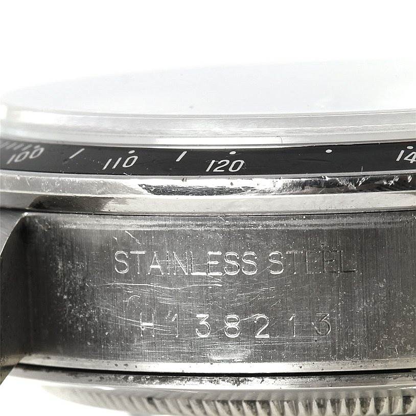 This image shows a close-up side view of the bezel and case of a Tudor Tiger 79260 Men's Stainless Steel Silver Dial 79260 Men's Stainless Steel Silver Dial model watch.