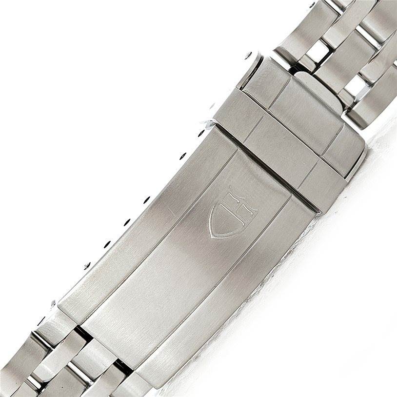 This image shows the clasp of the bracelet on a Tudor Hydronaut 89190 Men's Stainless Steel Beige Dial 89190 Men's Stainless Steel Beige Dial watch, highlighting the brand's engraved logo.