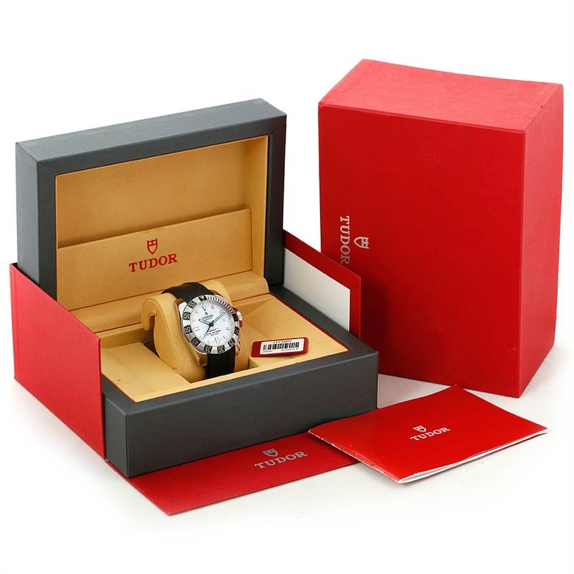 The Tudor Hydronaut 20040 Men's Stainless Steel White Dial 20040 Men's Stainless Steel White Dial watch is displayed front-on in its box, accompanied by additional packaging and manuals.