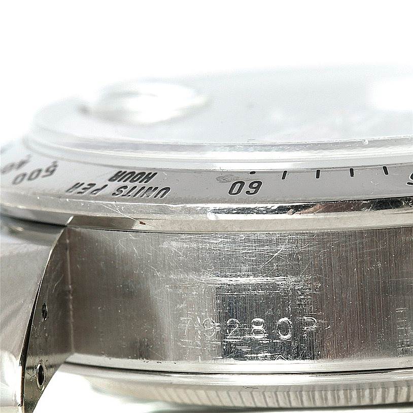 The image shows a close-up side view of the bezel and case with serial number of the Tudor Tiger 79280P Men's Stainless Steel Black Dial 79280P Men's Stainless Steel Black Dial watch model.