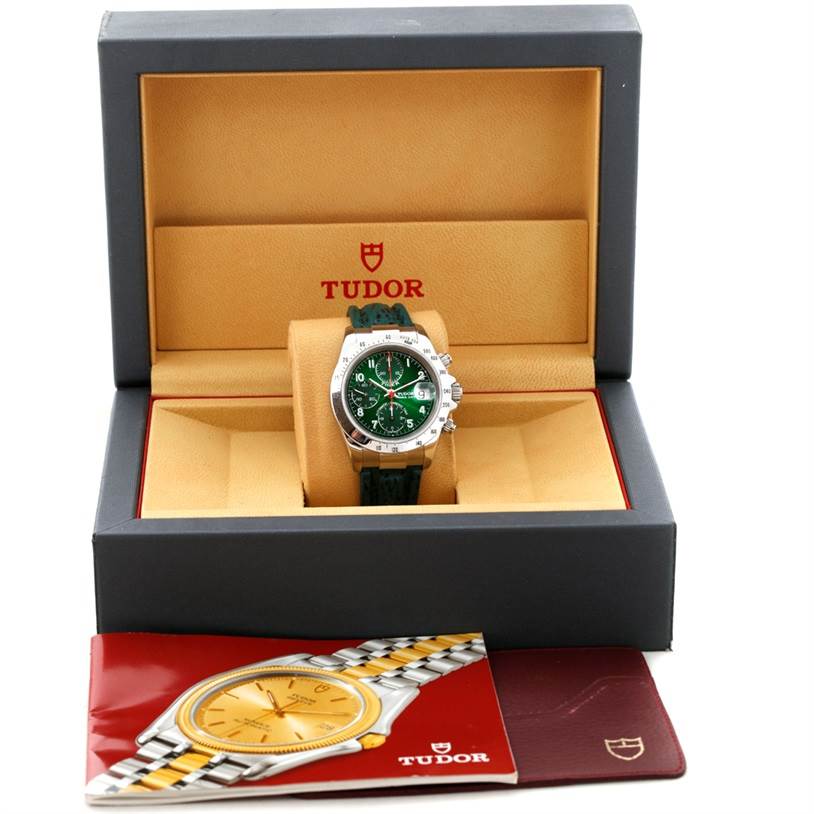 The Tudor Tiger 79280P Men's Stainless Steel Green Dial 79280P Men's Stainless Steel Green Dial model watch is shown from the front, displayed in an open box with its manuals and warranty card.