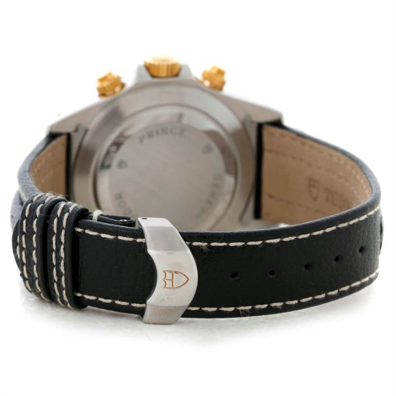 The image shows the back of a Tudor Tiger 79263 Men's Steel and Gold (two tone) White Dial 79263 Men's Steel and Gold (two tone) White Dial watch, highlighting the leather strap and metal clasp with the logo.