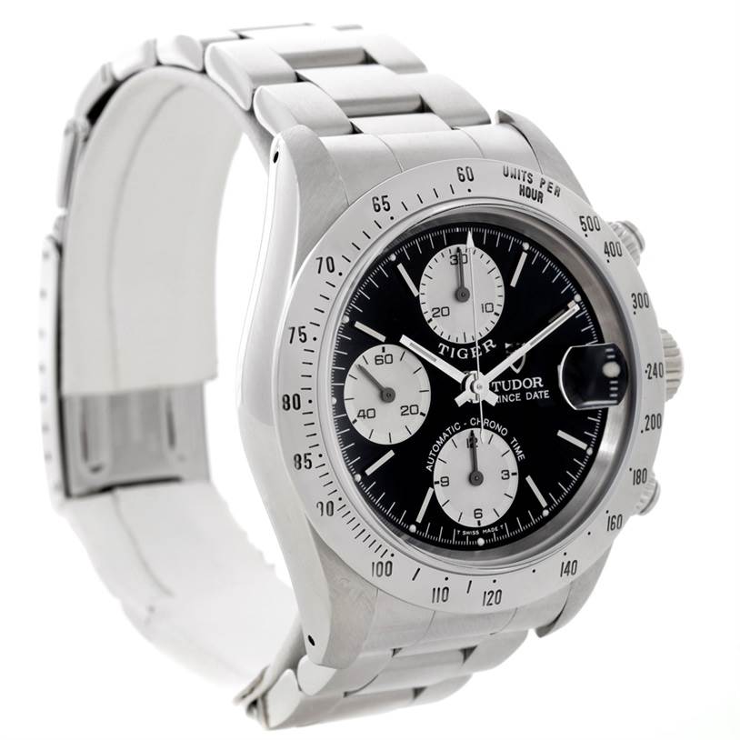 The image shows a Tudor Prince Date watch at a three-quarter angle, highlighting its dial, bracelet, and clasp.