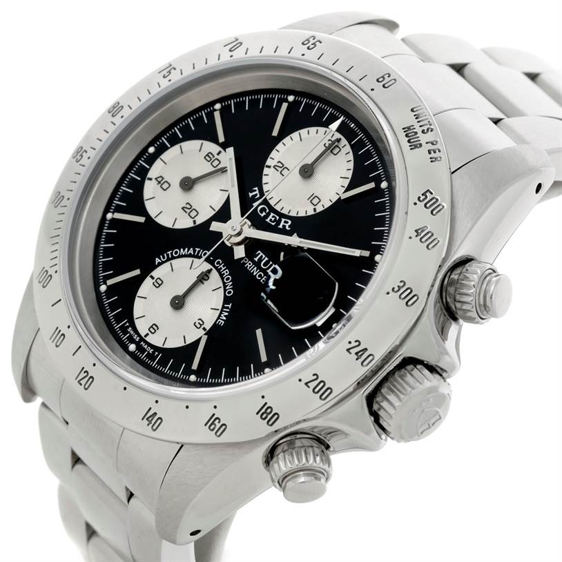 The image shows a Tudor Prince watch at an angled view, highlighting the bezel, dial, chronograph sub-dials, and pushers.