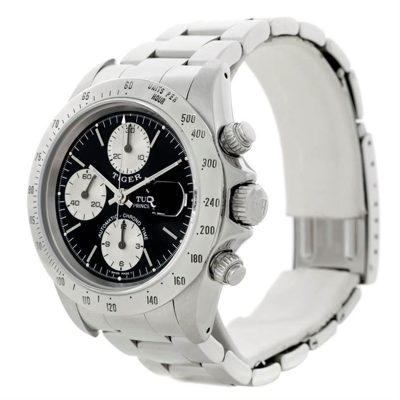 The Tudor Prince watch is shown at a three-quarter angle, highlighting the face, bezel, crown, pushers, and metal bracelet.