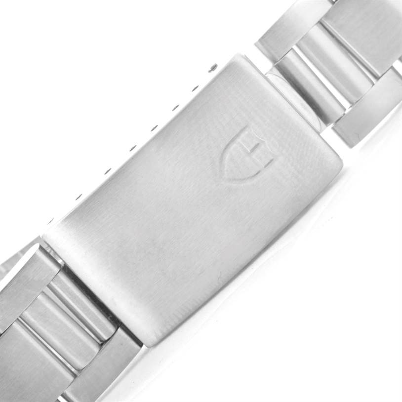 This image shows a close-up of the clasp and part of the bracelet of a Tudor Tiger 79280 Men's Stainless Steel Green Dial 79280 Men's Stainless Steel Green Dial model watch.
