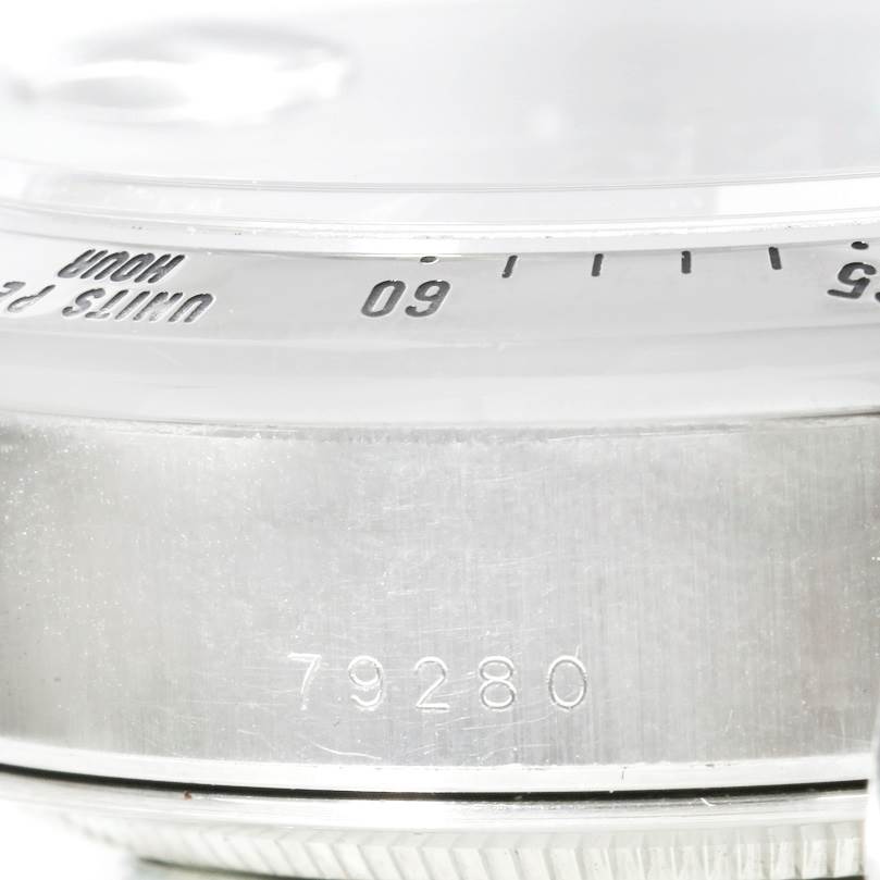 Close-up angle of the bezel and case side of the Tudor Tiger 79280 Men's Stainless Steel Green Dial 79280 Men's Stainless Steel Green Dial model watch, showing the serial number.