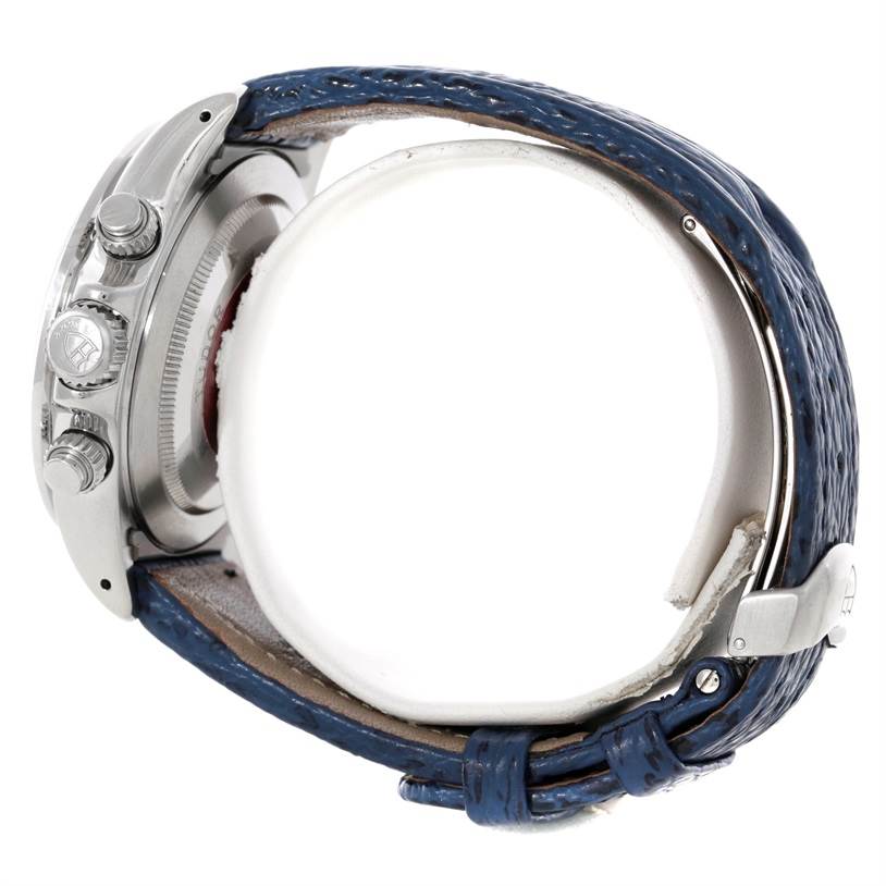 This image shows a side view of the Tudor Tiger 79280 Men's Stainless Steel Blue Dial 79280 Men's Stainless Steel Blue Dial watch, focusing on the case and crown with a blue leather strap.