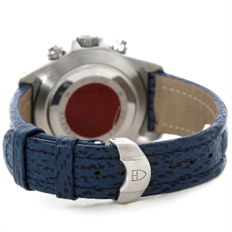 The image shows the back view of the Tudor Tiger 79280 Men's Stainless Steel Blue Dial 79280 Men's Stainless Steel Blue Dial model watch, focusing on the case back and blue leather strap with buckle.