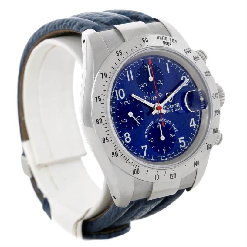 The image shows a Tudor Tiger 79280 Men's Stainless Steel Blue Dial 79280 Men's Stainless Steel Blue Dial model watch angled from the front-left, highlighting the blue dial, bezel, crown, and strap.