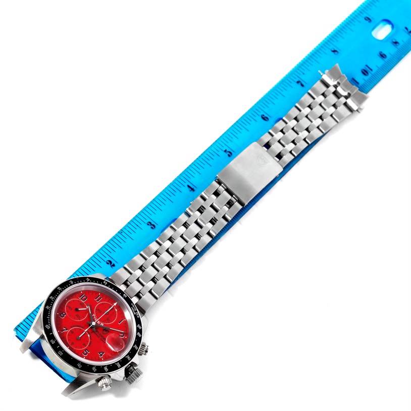 The image shows a Tudor Prince model watch from a top-down angle, placed alongside a blue ruler for measurement.