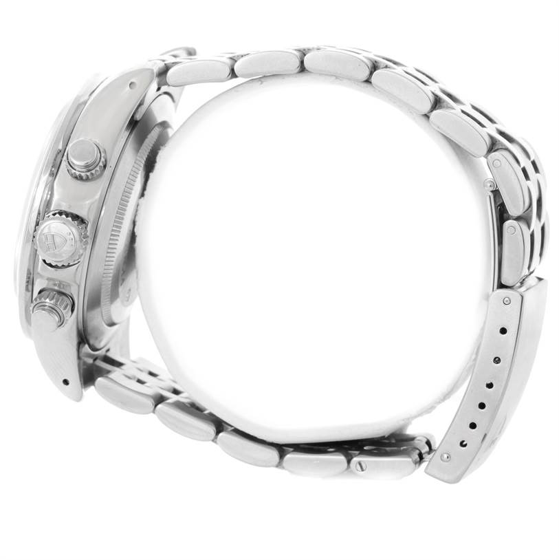 The image shows a side view of the Tudor Prince watch, highlighting its crown, buttons, and metal bracelet.