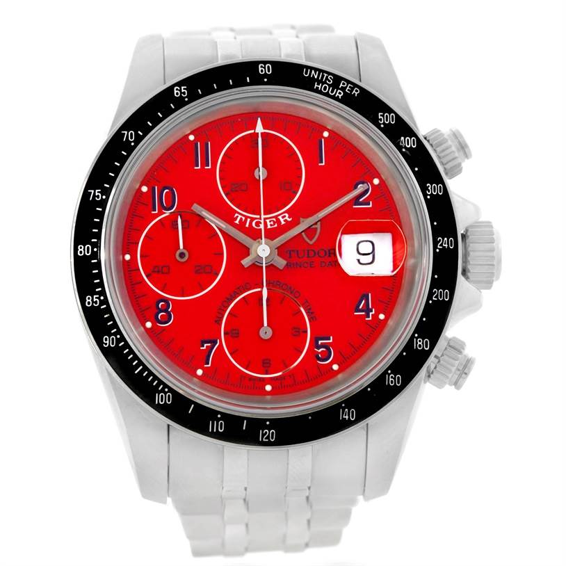 The image shows a front view of the Tudor Prince model watch, highlighting the red dial, date window, bezel, and chronograph sub-dials.