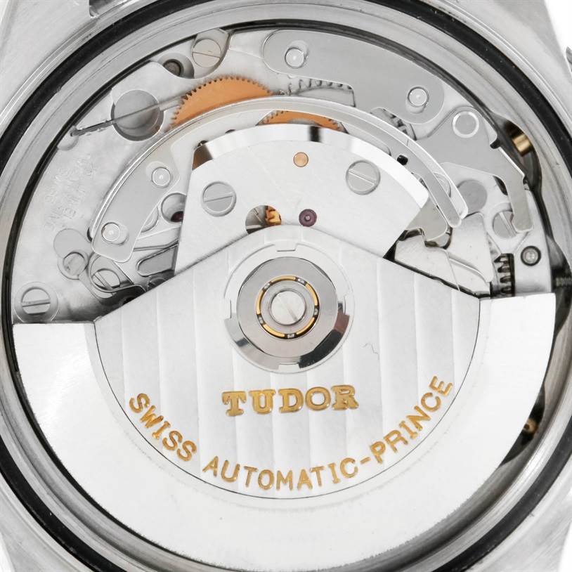 The image shows a close-up view of the movement inside the Tudor Prince model watch, highlighting its intricate mechanical parts.