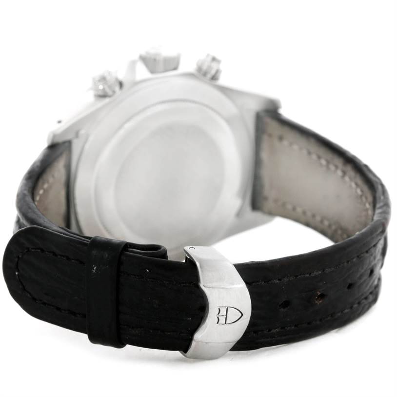 The image shows the back view of a Tudor Prince watch, focusing on the case and leather strap with the Tudor logo on the buckle.