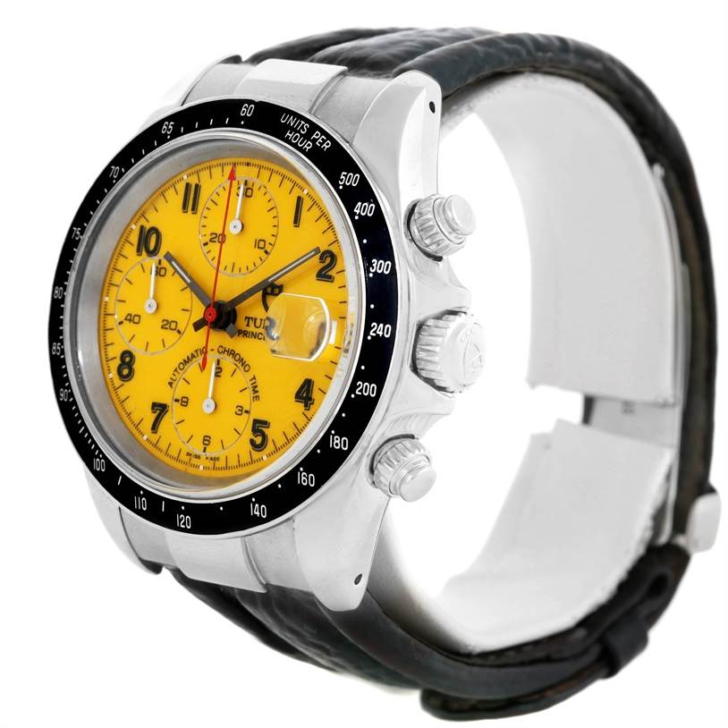 The image shows a side and front angle of a Tudor Prince model watch, highlighting its yellow dial, bezel, and chronograph pushers.