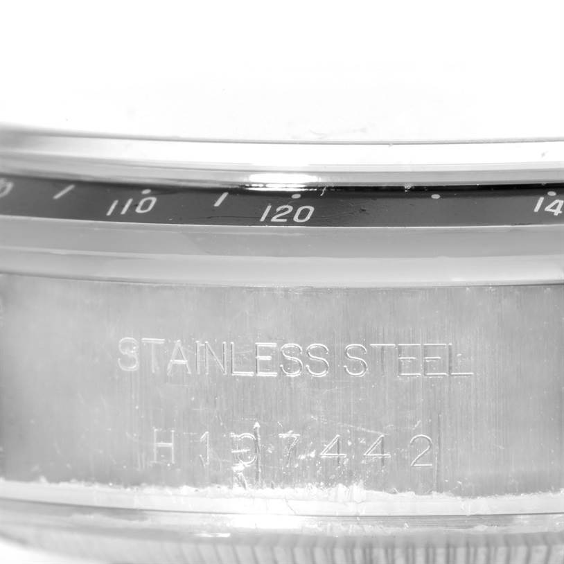 The image shows a close-up of the case side and bezel of the Tudor Prince model watch, highlighting the "STAINLESS STEEL" engraving.