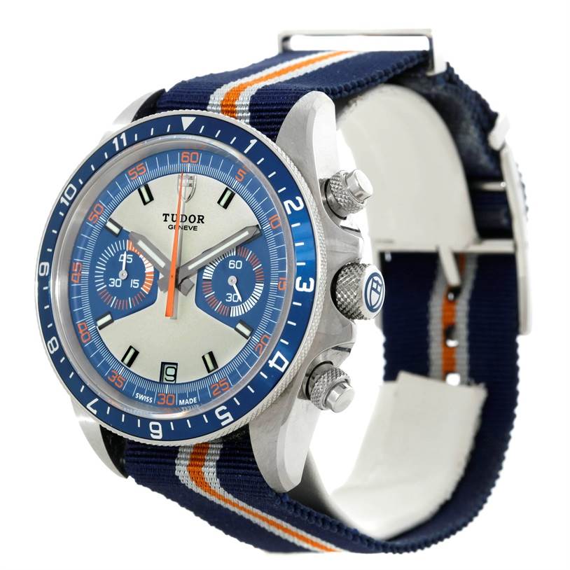 The image shows a Tudor Heritage Chrono 79220R Men's Stainless Steel Blue Dial 79220R Men's Stainless Steel Blue Dial watch from a slightly angled side view, displaying the face, crown, pushers, and NATO strap.