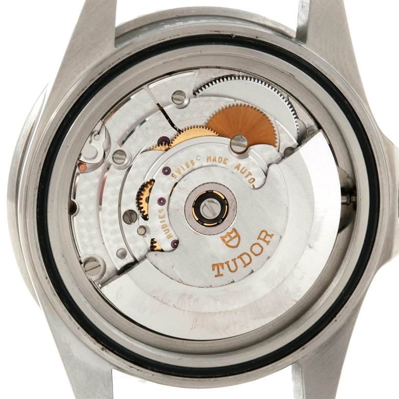 The image shows the back view of the Tudor Submariner 75190 Men's Stainless Steel Pink Dial 75190 Men's Stainless Steel Pink Dial watch, highlighting its automatic movement mechanism.