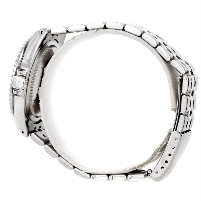 The image shows the side profile of a Tudor Submariner 75190 Men's Stainless Steel Pink Dial 75190 Men's Stainless Steel Pink Dial watch, highlighting the case, crown, and bracelet.