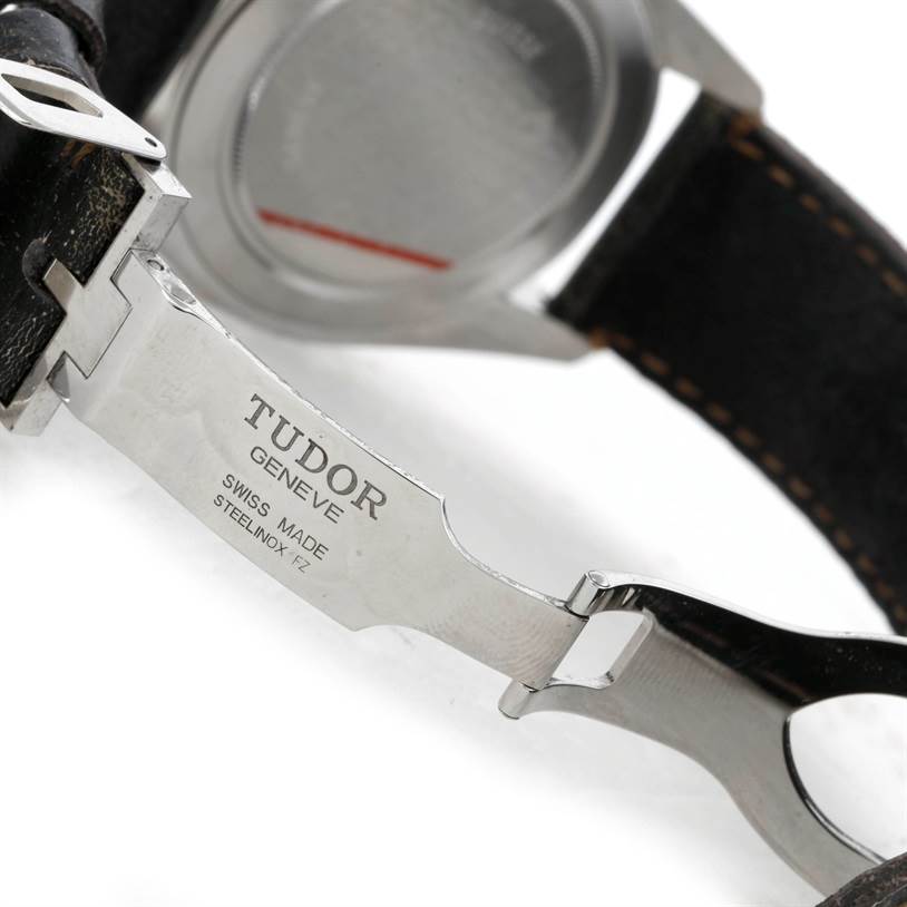 The image shows the underside clasp and part of the back case of the Tudor Heritage Black Bay 79220R Men's Stainless Steel Black Dial 79220R Men's Stainless Steel Black Dial watch.