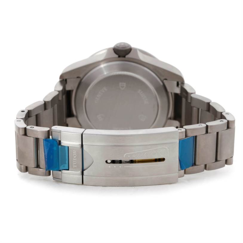 The image shows the backside and clasp of a Tudor Pelagos 25500TN Men
s Titanium Black Dial 25500TN Men
s Titanium Black Dial watch, highlighting the bracelet and case back.