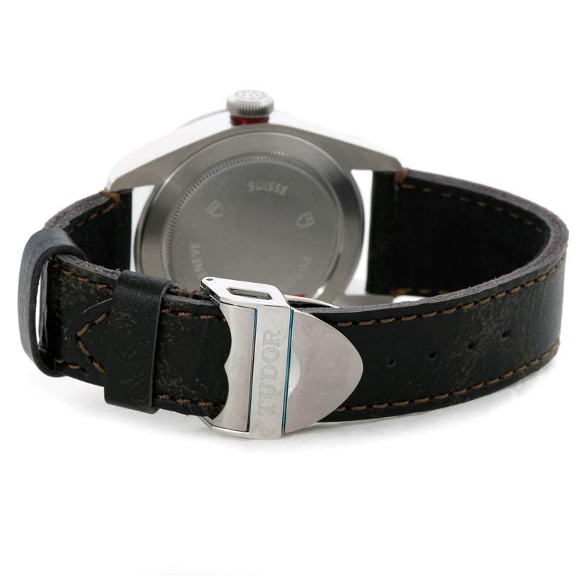 The image shows the back case and leather strap with clasp of the Tudor Heritage Black Bay 79220R Men's Stainless Steel Black Dial 79220R Men's Stainless Steel Black Dial watch.