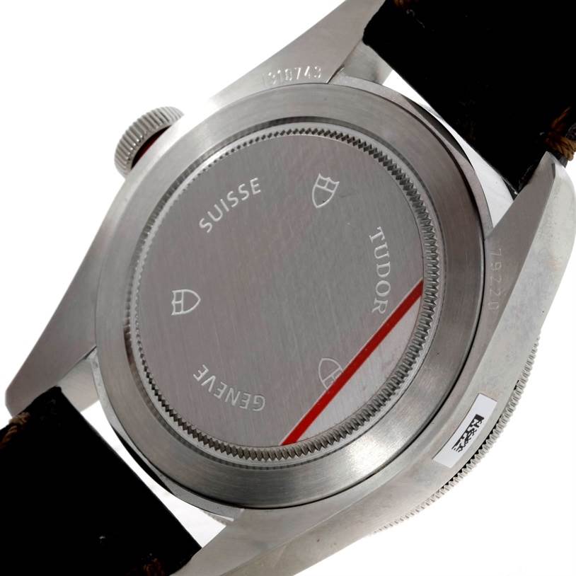 The image shows the back case of a Tudor Heritage Black Bay 79220R Men's Stainless Steel Black Dial 79220R Men's Stainless Steel Black Dial watch from an angled view.