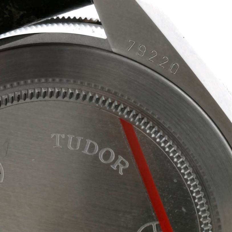 The image shows a close-up angled view of the case back and lug area of the Tudor Heritage Black Bay 79220R Men's Stainless Steel Black Dial 79220R Men's Stainless Steel Black Dial watch, highlighting the engraved model number 79220.