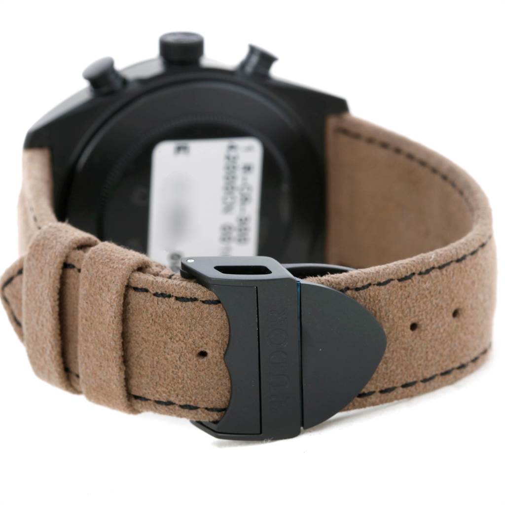 This image shows the back of the Tudor Fastrider 42000CN Men's Stainless Steel Black Dial 42000CN Men's Stainless Steel Black Dial watch, highlighting the suede strap and black buckle clasp.