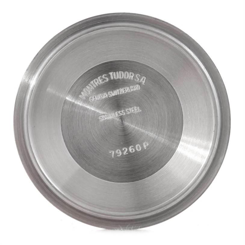 This image shows the stainless steel case back of a Tudor Tiger 79260 Men's Stainless Steel Silver Dial 79260 Men's Stainless Steel Silver Dial model watch, viewed from above.