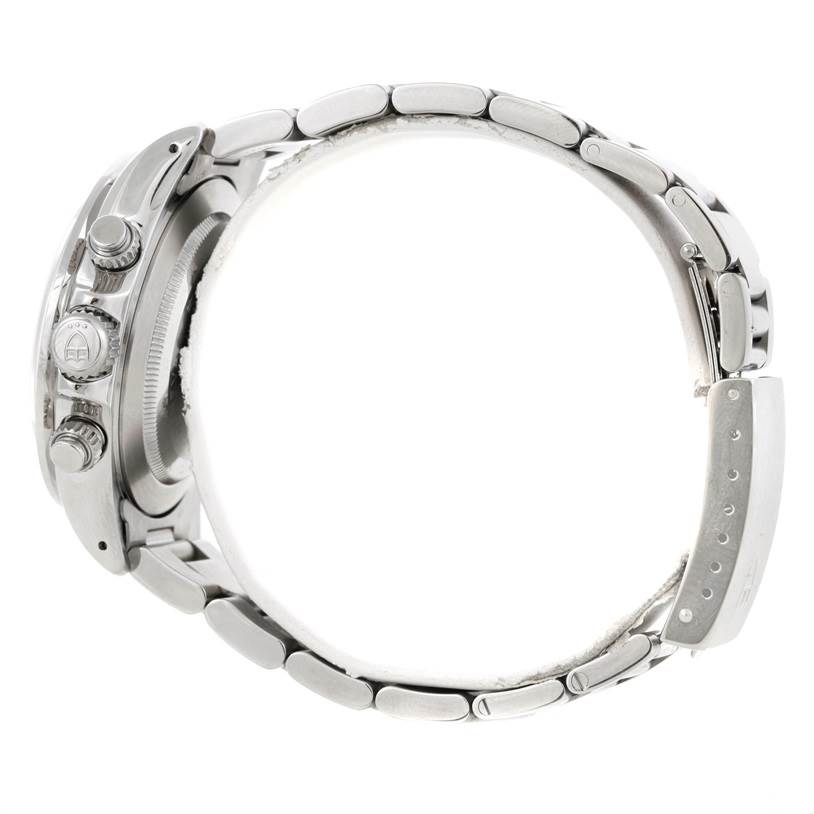 This Tudor Tiger 79260 Men's Stainless Steel Silver Dial 79260 Men's Stainless Steel Silver Dial watch is shown from a side angle, displaying its crown, pushers, and metal bracelet.