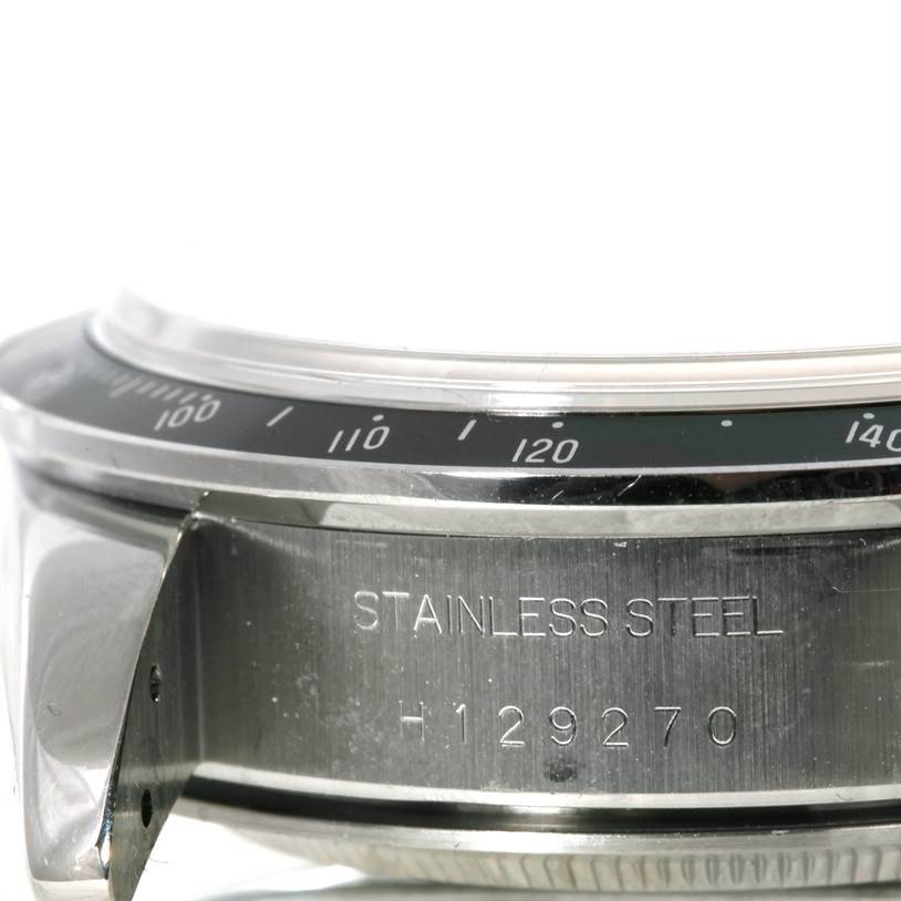 The image shows a side view of the Tudor Tiger 79260 Men's Stainless Steel Silver Dial 79260 Men's Stainless Steel Silver Dial watch case, highlighting its stainless steel and partial bezel with engraved numbers.