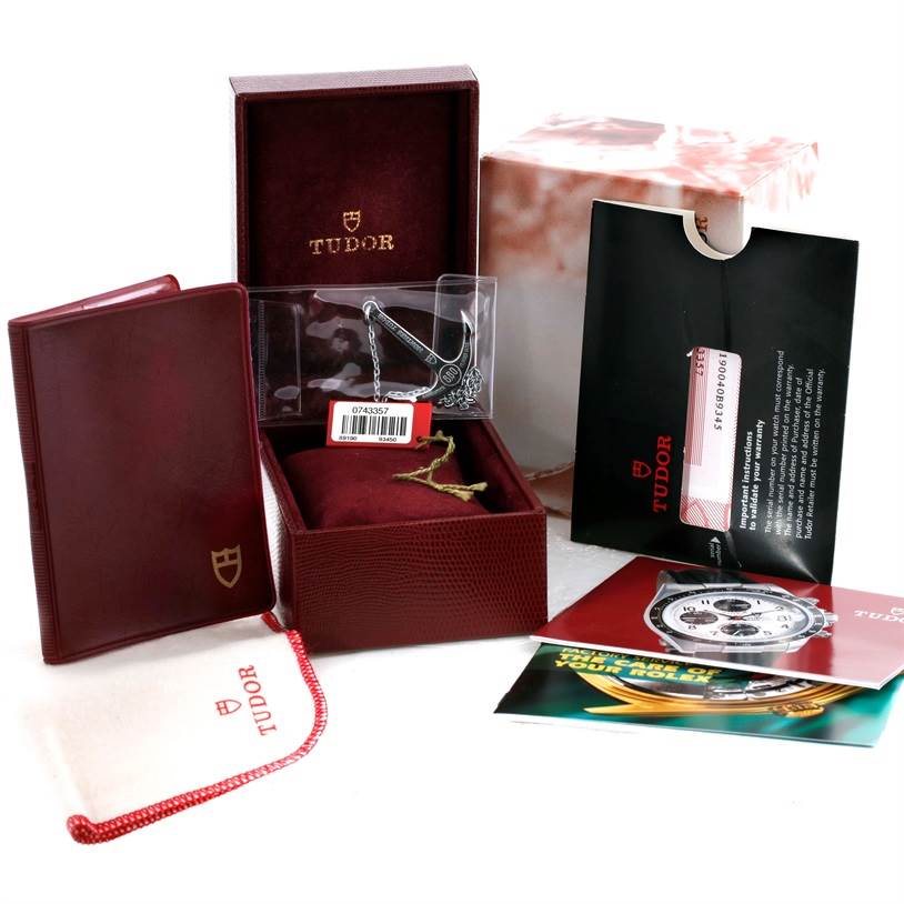 The image shows a Tudor Hydronaut 89190 Men's Stainless Steel Silver Dial 89190 Men's Stainless Steel Silver Dial watch's packaging, accessories, and documentation from a top-down angle.