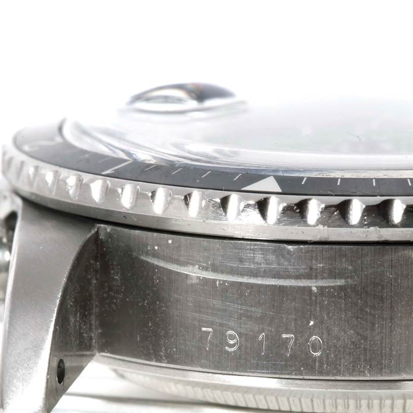 The image shows a side angle of the Tudor Big Block 79170 Men's Stainless Steel Silver Dial 79170 Men's Stainless Steel Silver Dial model watch, highlighting the bezel, case, and serial number.
