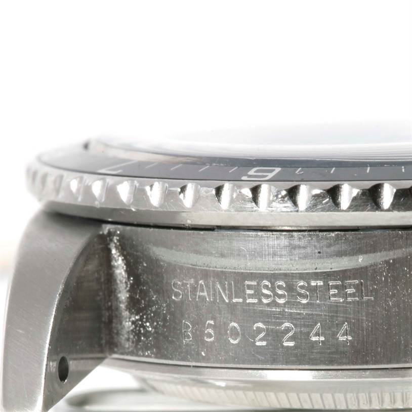 The image shows a side view of the Tudor Big Block 79170 Men's Stainless Steel Silver Dial 79170 Men's Stainless Steel Silver Dial model watch, highlighting the bezel, case, and engraved serial number.
