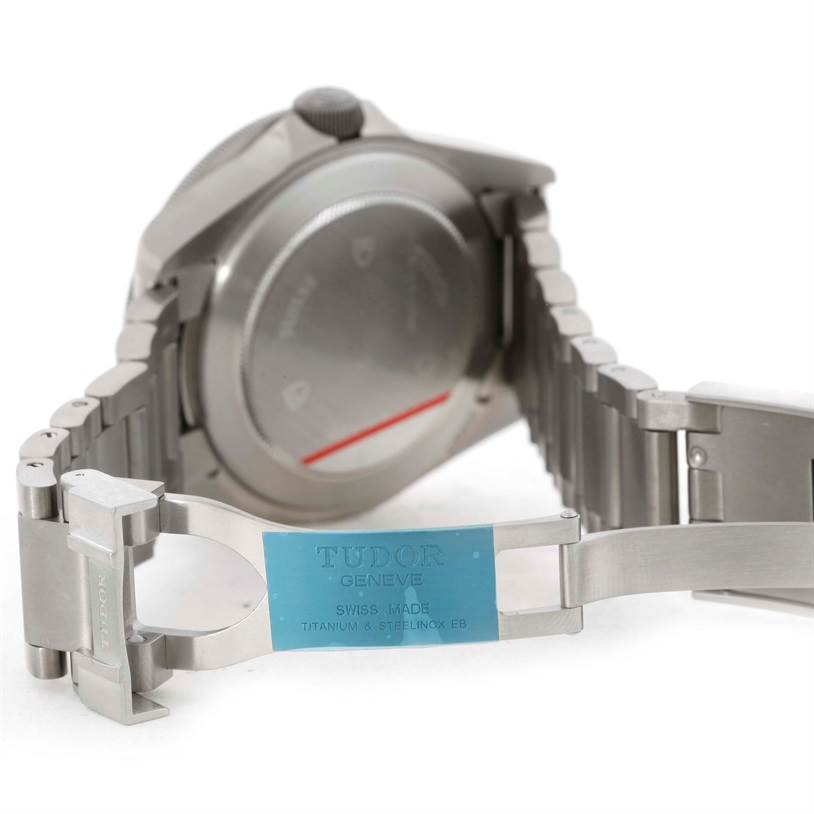 This image shows the back and clasp of a Tudor Pelagos 25500TN Men's Titanium Black Dial 25500TN Men's Titanium Black Dial watch, highlighting its stainless steel bracelet and case back.