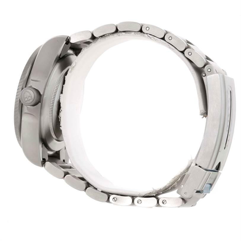 The image shows a side view of the Tudor Pelagos 25500TN Men's Titanium Black Dial 25500TN Men's Titanium Black Dial watch, highlighting the clasp and bracelet links.